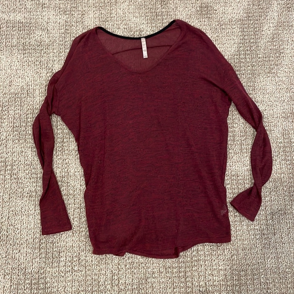 Maroon long sleeve. Perfect for layering or pairing with leggings.